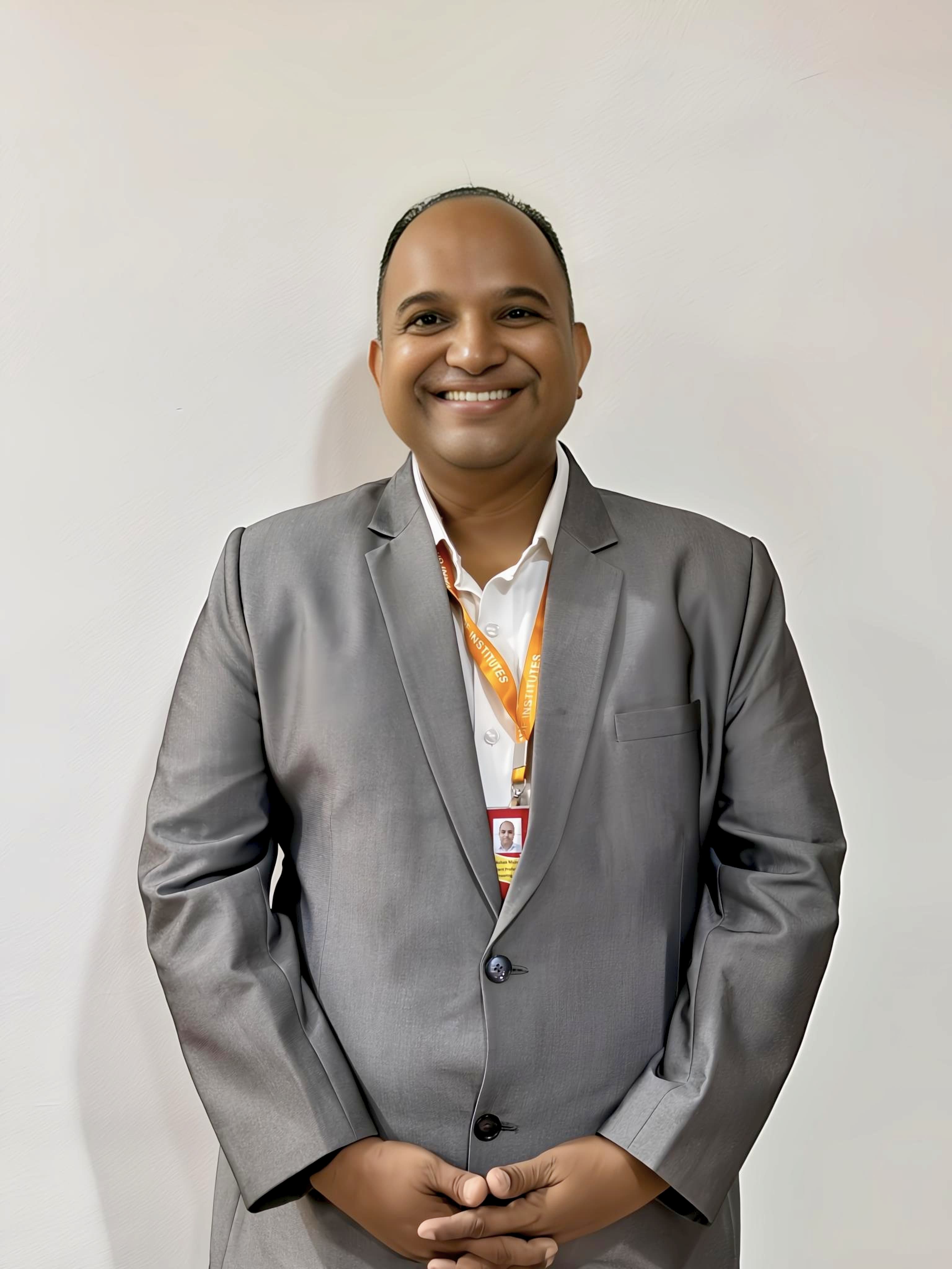 Dr. Ajit Ashok Muzumdar